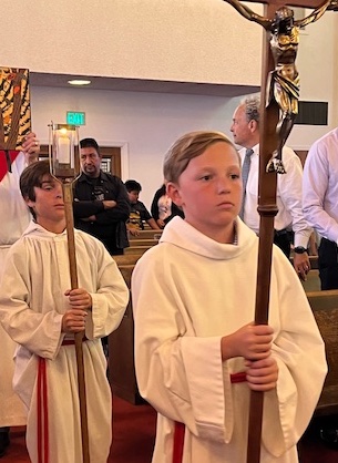 Altar Servers walking down aisle