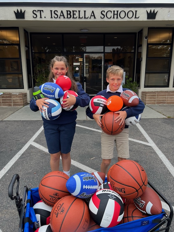 Students in front of balls